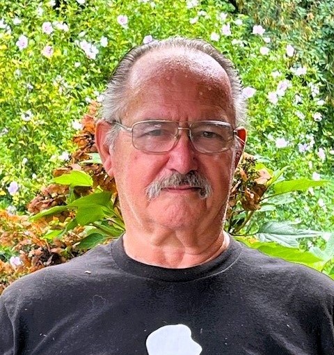 TOM HANSEL